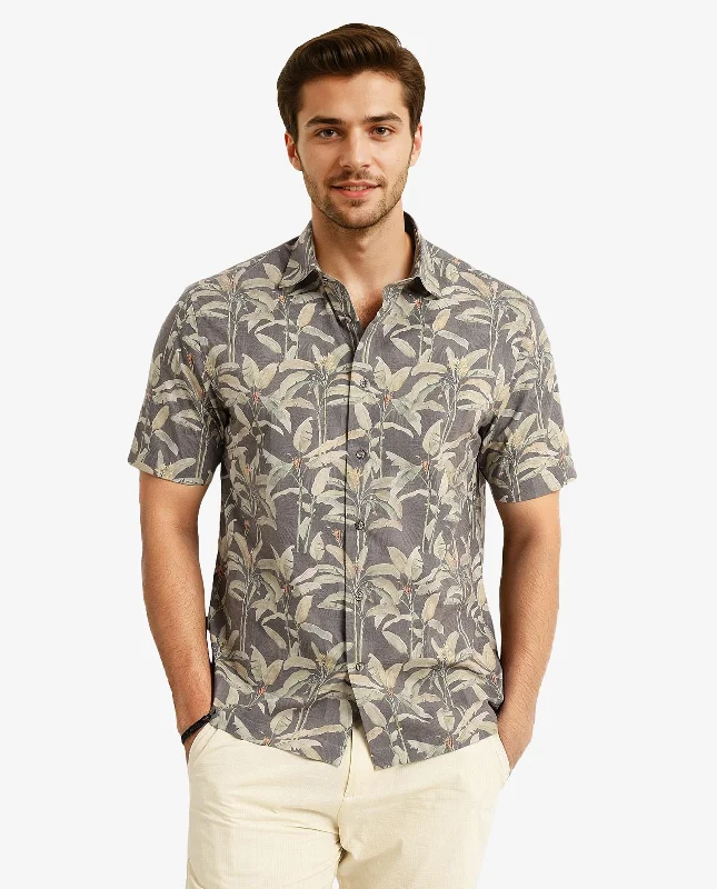 Men's Solid-Color Block Shirts for a Bold StatementRare Rabbit Men Faus Light Brown Polyester Viscose Fabric Short Sleeves Boxy Fit Tropical Print Shirt Men's Solid-Color Block Shirts for a Bold StatementRare Rabbit Men Faus Light Brown Polyester Viscose Fabric Short Sleeves Boxy Fit Tropical Print Shirt