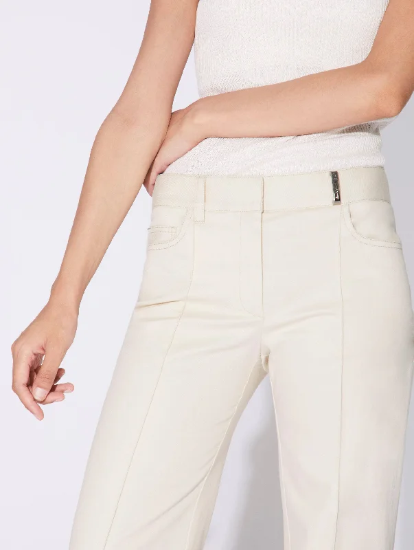 Cream washed denim flared trousers